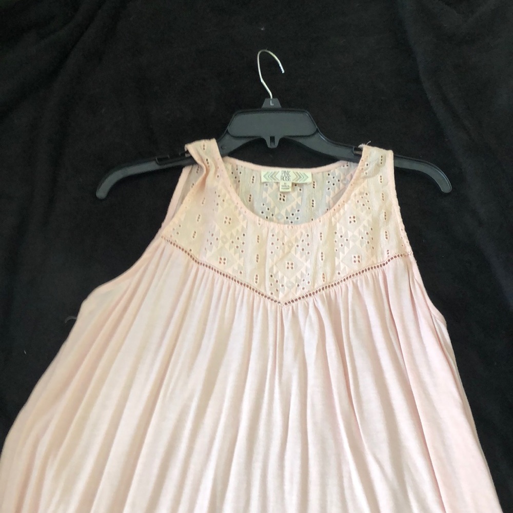 Adorable pink frilly tank.